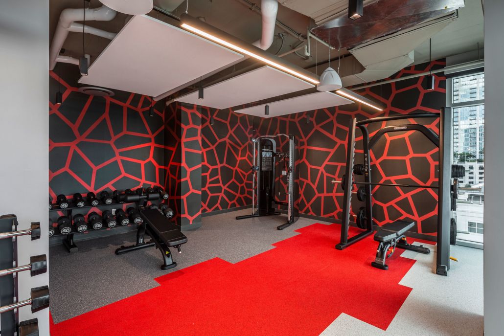 Fitness center at The Henry apartments near usf 90cd68144d31b6b611badb460bbe6974